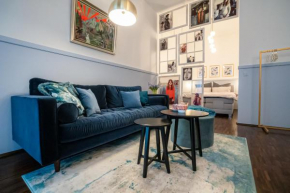 Designer Loft-Ferienwohnung im Zentrum mit Tiefgaragen-Parkplatz, Waschmaschine und Privatterrasse